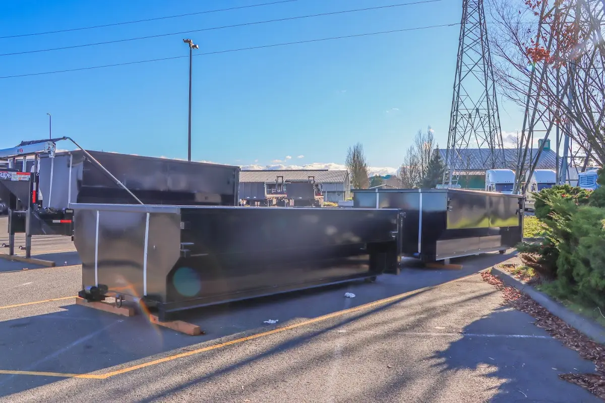 Roll-off dumpster ready for waste disposal at job site for 3 Yard Dumpster Rental in Merritt Island